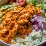 Delicious Buffalo Chicken Bowls with toppings and garnishes
