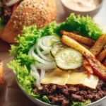 Delicious homemade burger bowls topped with fresh ingredients.