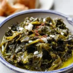 Plate of vibrant Greek greens showcasing fresh herbs and leafy vegetables