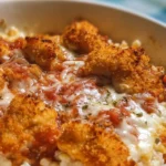 Cottage Cheese Chicken Parm Bowl with cheese and herbs