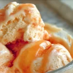 Delicious bowl of nectarine frozen yogurt topped with fresh fruit