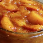 Homemade Nectarine Spice Butter spread on toast with spices